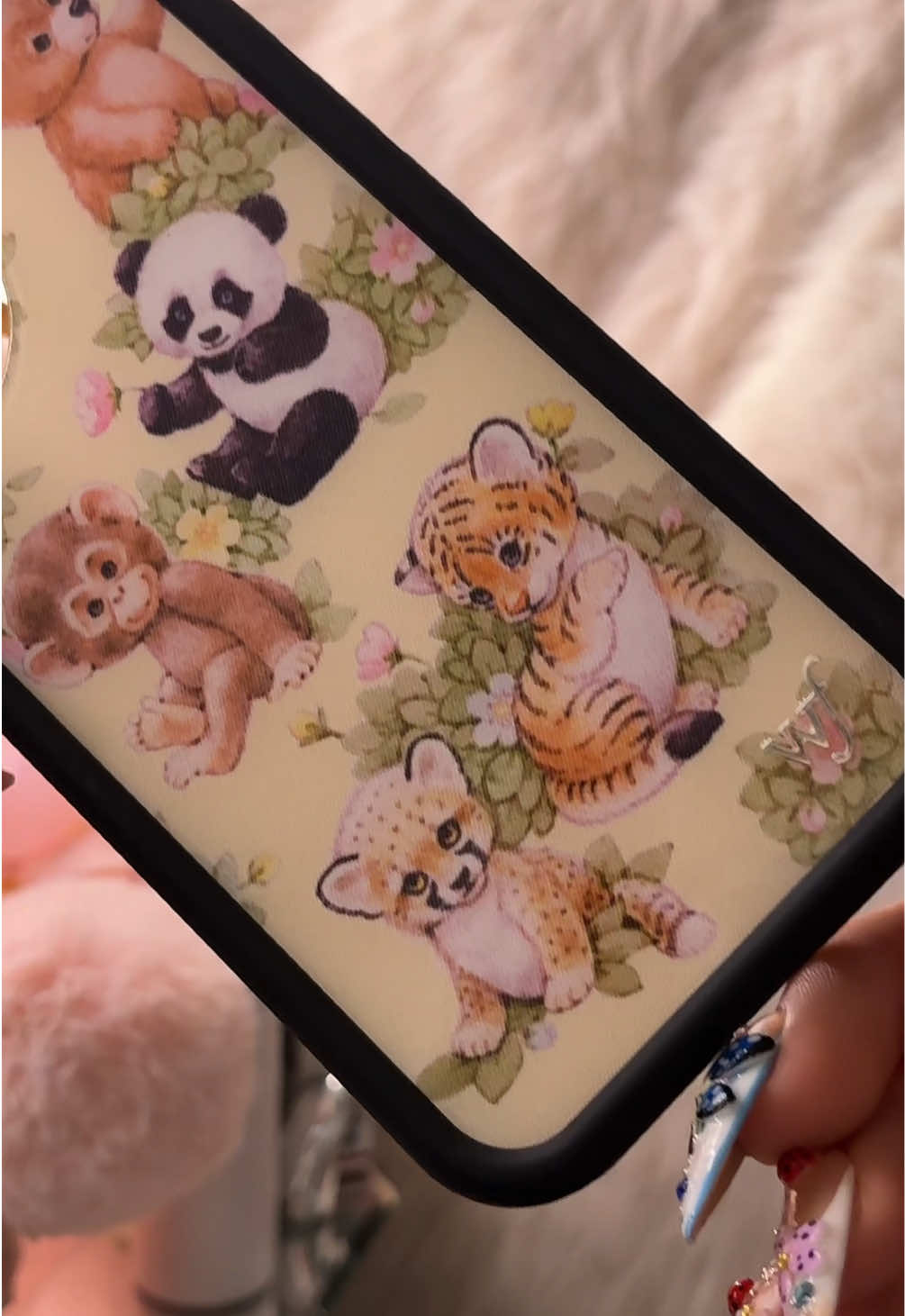 TikTok post by @tanyaa0444 for Wildflower Cases. Caption reads: new phone case <3 #wildflowercases #iphone....