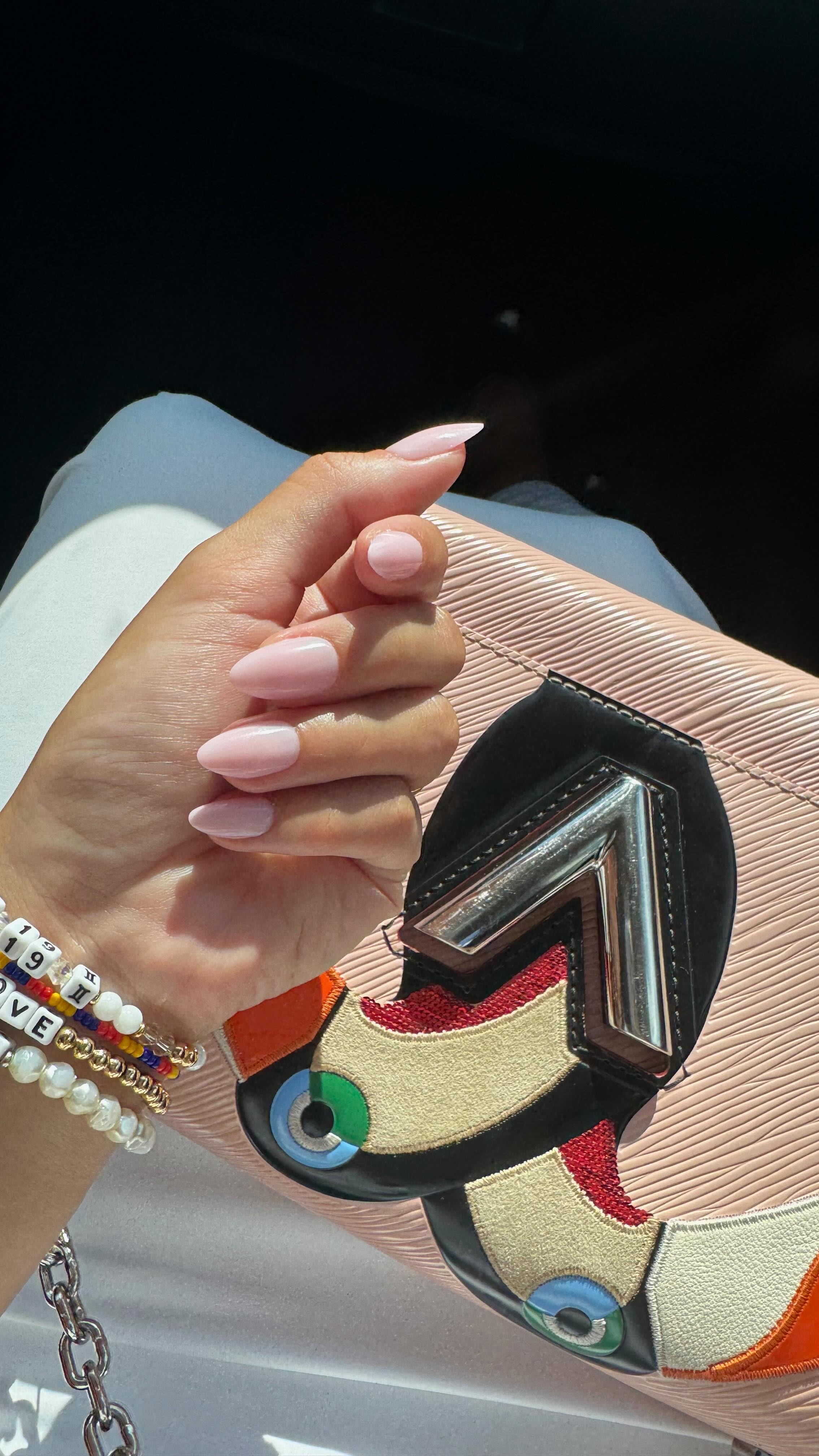 Instagram post by @l0vemarisa for Static Nails. Caption reads: GRWM for a brunch + beach day in Miami using....