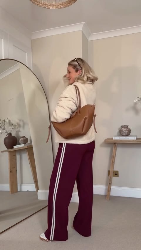 Instagram post by @laura.byrnes for Sweaty Betty. Caption reads: [...] on-the-go outfits! Ad all from @sweatybetty....