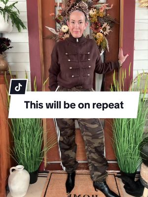 TikTok post by @aestheticaleestyles for Katch Me Chic. Caption reads: [...] sweatpants @Edikted Military sweater @Katch....