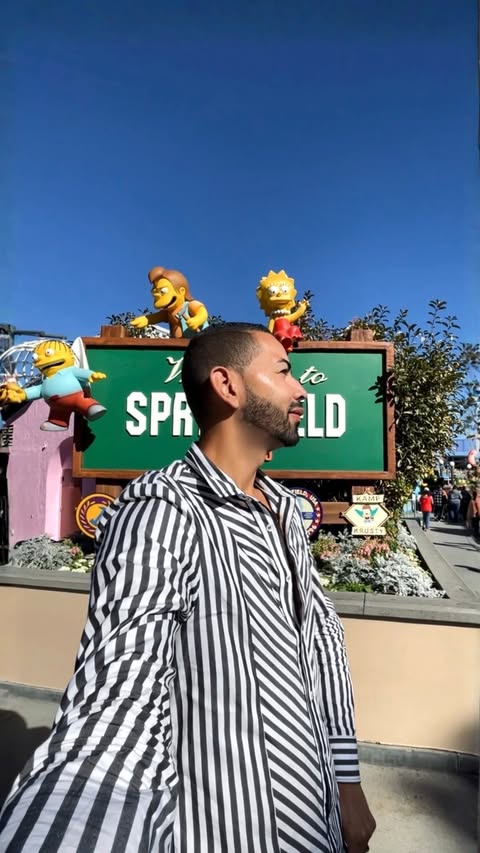 Instagram post by @poloshyyt for Universal Studios Hollywood. Caption reads: [...] one happen 🫶 #getyourguide....