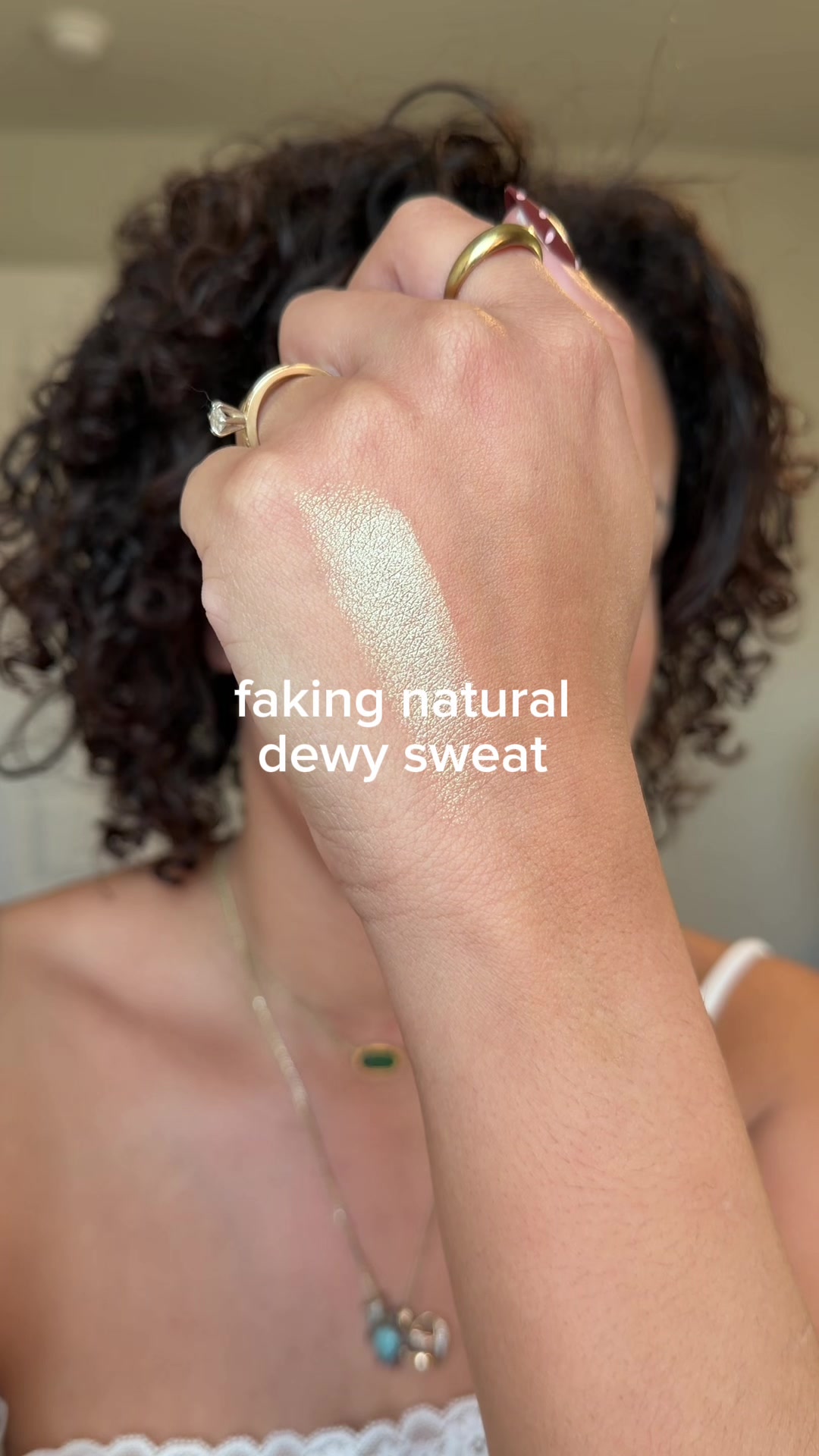 TikTok post by @chicwithkels for Godmode Beauty. Caption reads: easy sweaty glow with @GODMODE BEAUTY glow....