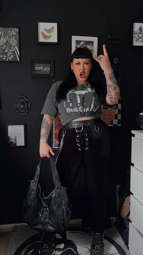 Instagram post by @rhikatera for Damaged Society. Caption reads: [...] at @slamdunkmusic this year 👀 Tee:....