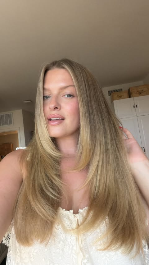 Instagram post by @astoldbymeredith for Drybar. Caption reads: [...] blowout at home using some of my @thedrybar....