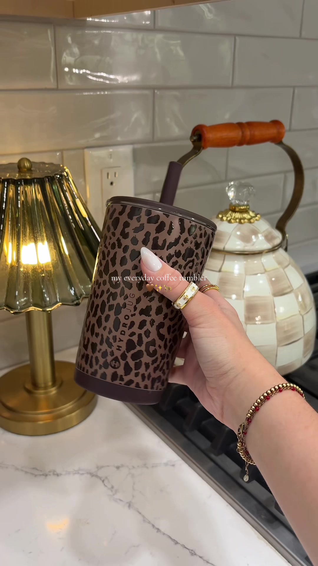 TikTok post by @dear.holls for HYDROJUG. Caption reads: [...] coffee 🤎✨🧋#coffee #coffeetiktok #hydrojug....