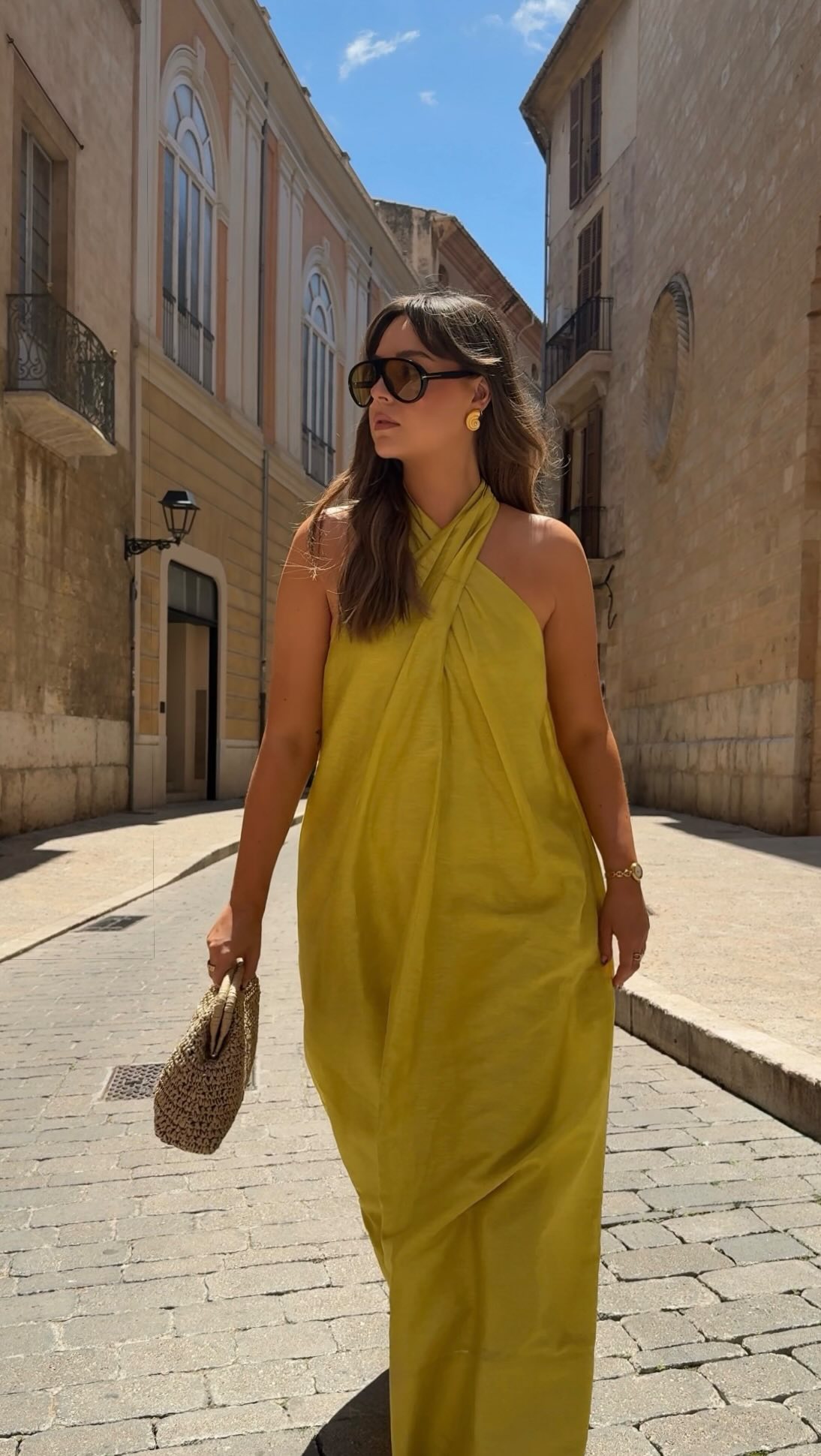 Instagram post by an influencer for John Lewis & Partners. Caption reads: AD | Dress for joy this summer 🌻💚 Turn up the....