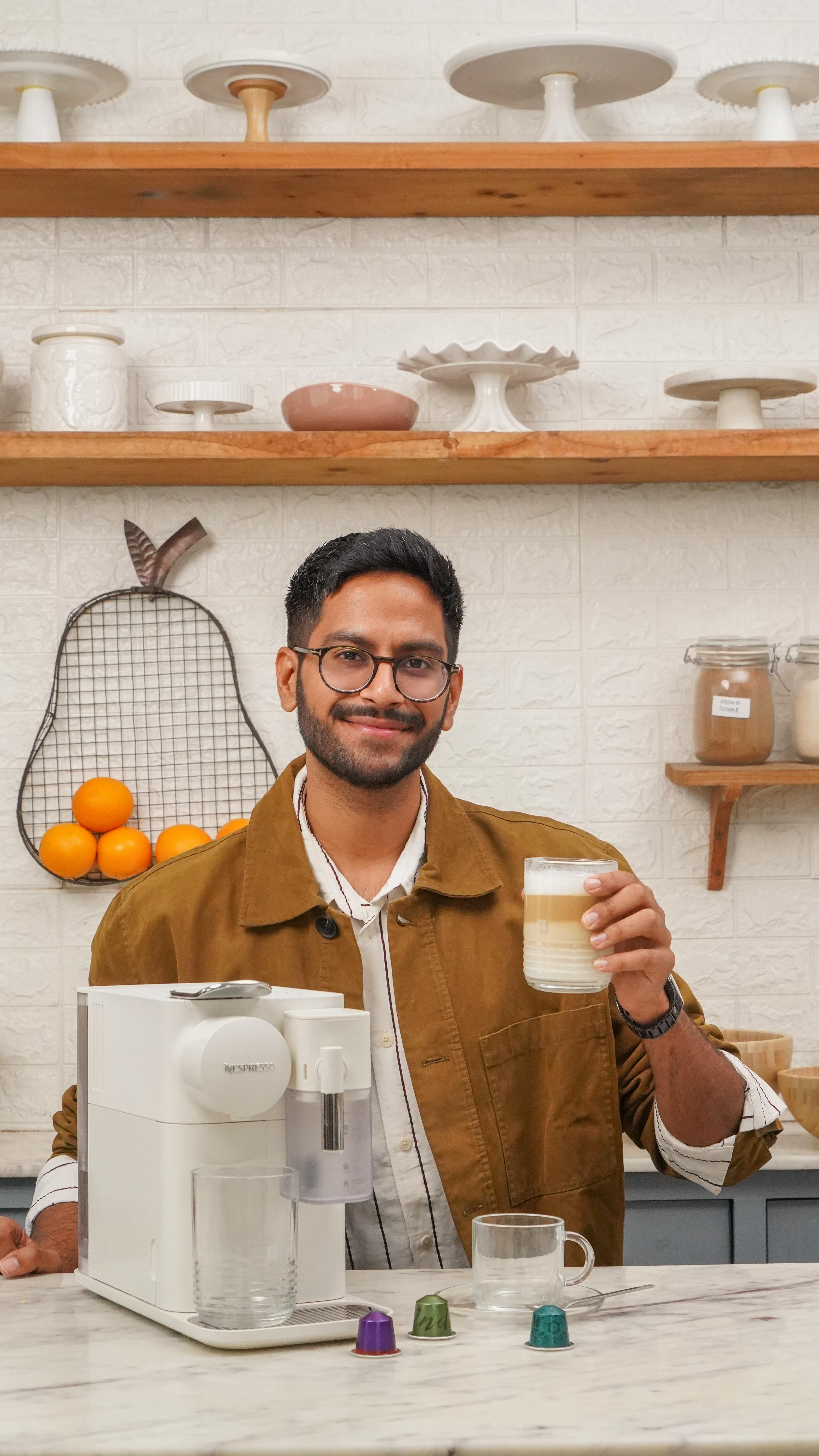 Instagram post by @shivesh17 for Nespresso. Caption reads: Your everyday coffee, but make it festive☕✨ This....