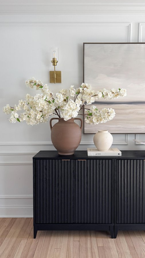 Instagram post by @meggieferrerhome for Afloral. Caption reads: These stunning cherry blossoms from @afloral are....