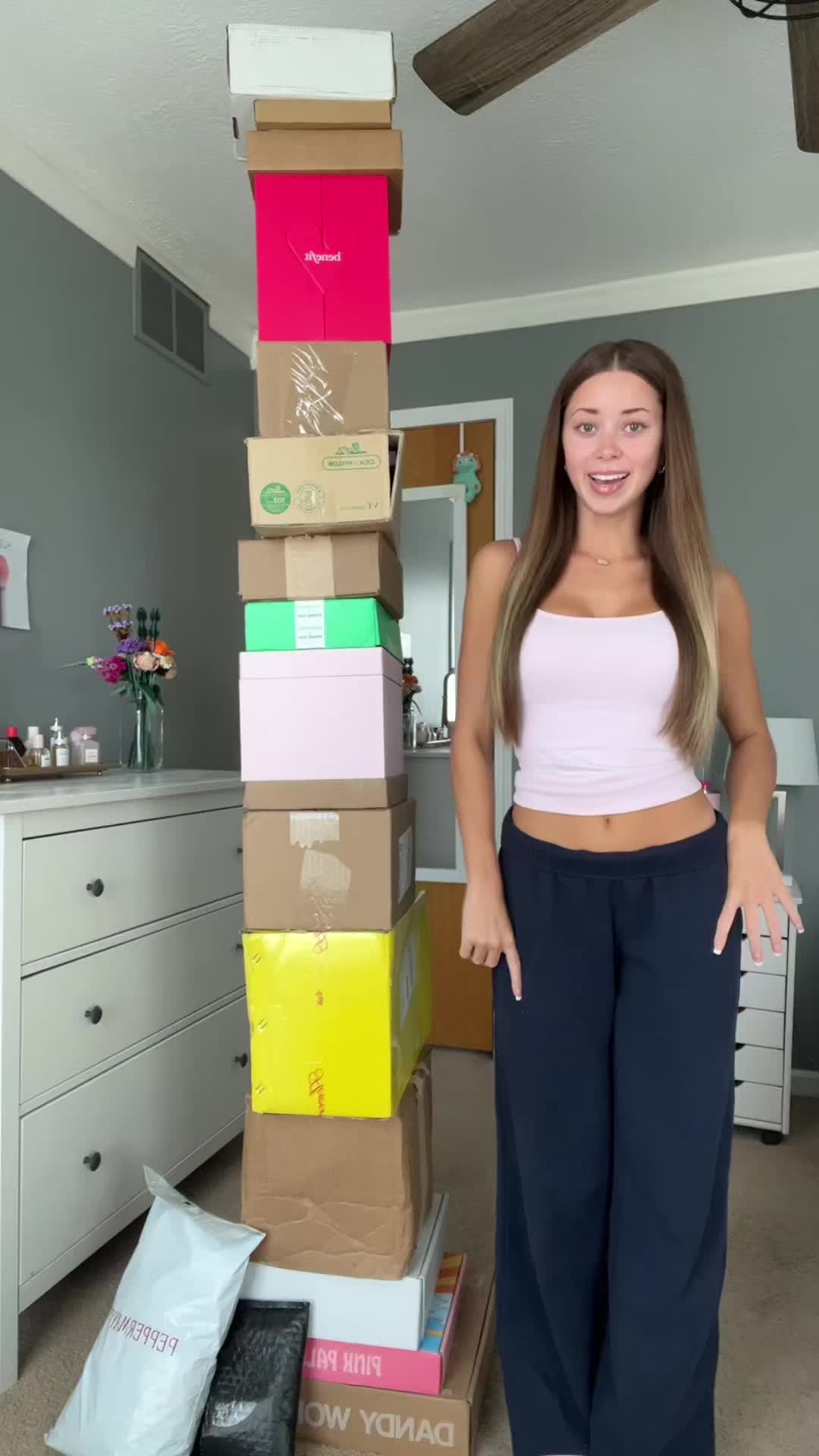 TikTok post by @ashleycosticgrwm for Alani Nutrition. Caption reads: I think this is my biggest haul yet… #pr #haul....
