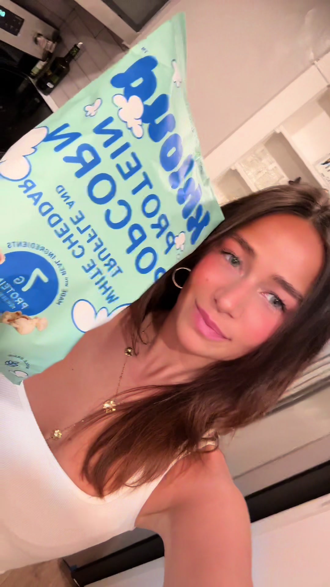 TikTok post by @hattiemholmes for KhloudFoods. Caption reads: new flavor unlocked @KhloudFoods #khloudpartner.