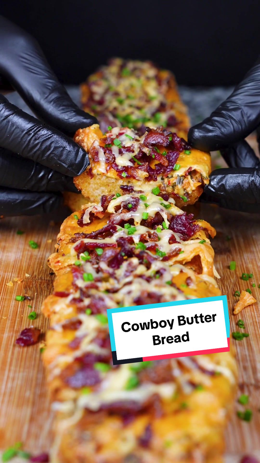 TikTok post by @firefoodfamily for Godshall's. Caption reads: Cowboy Butter Bread with @Godshall’s Beef Bacon is....