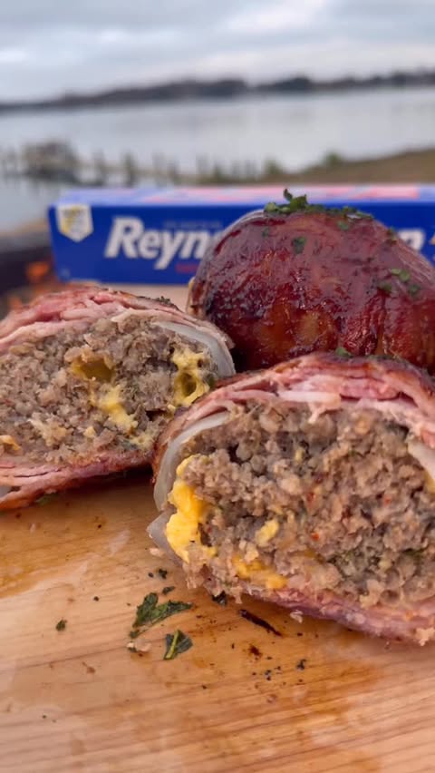 Instagram post by @grubwithjus for Reynolds Brands. Caption reads: [...] Onion Bombs 🔥😍 using @reynoldsbrands #ad....