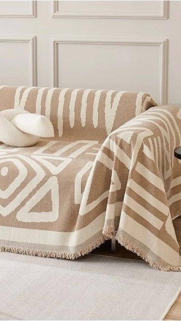 Instagram post by @rittakortava for slashop. Caption reads: Boho style sofa cover ✨ 
easy to set up✨ with a....