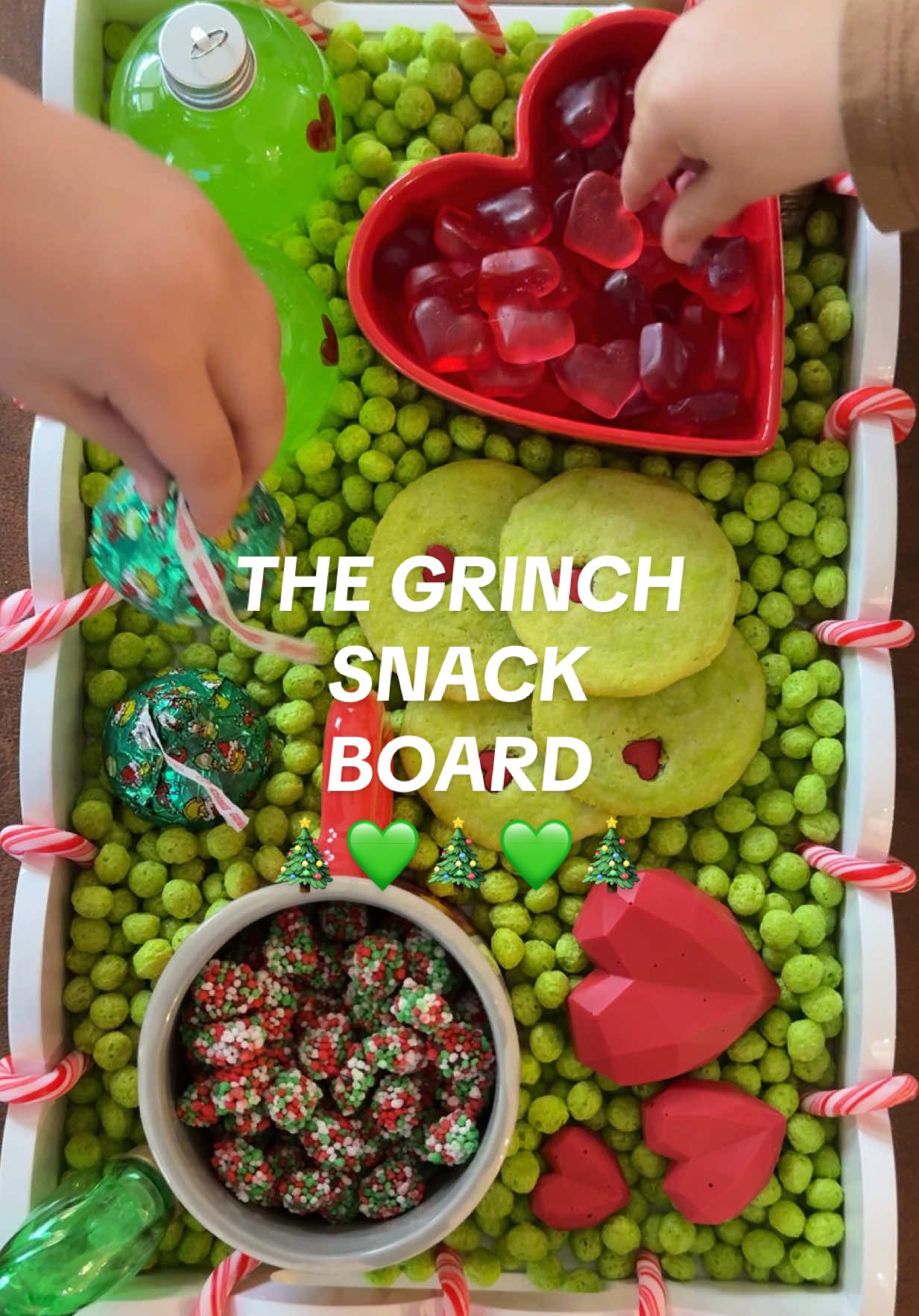 TikTok post by @jenn.ordway for Hersheyland. Caption reads: Tell me why the Grinch raided my kitchen and made....