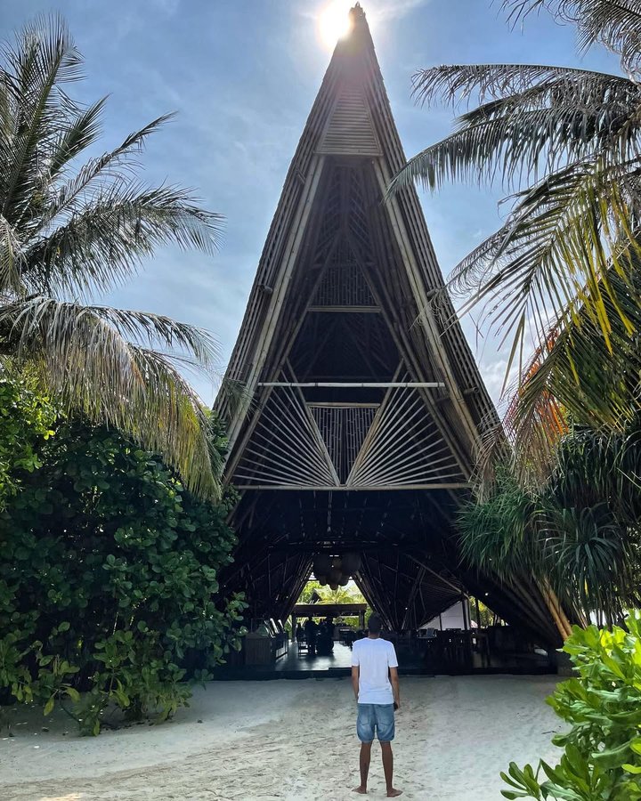 Instagram post by @travelingwithstyle_ for Small Luxury Hotels. Caption reads: Followed Nature : the resort's main restaurant,....