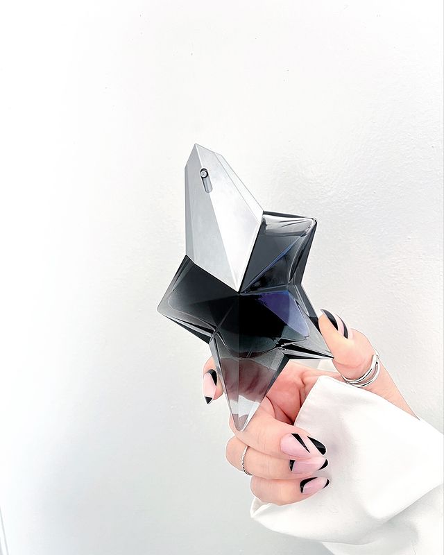 Instagram post by an influencer for MUGLER. Caption reads: NEW Mugler Angel Fantasm Fragrance [...].