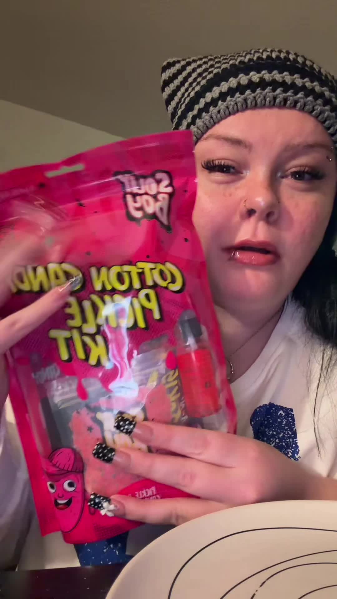 TikTok post by @meganluv777 for Sourboy Snacks. Caption reads: @Sourboy this was fire 🔥 #picklekit #cottoncandy....
