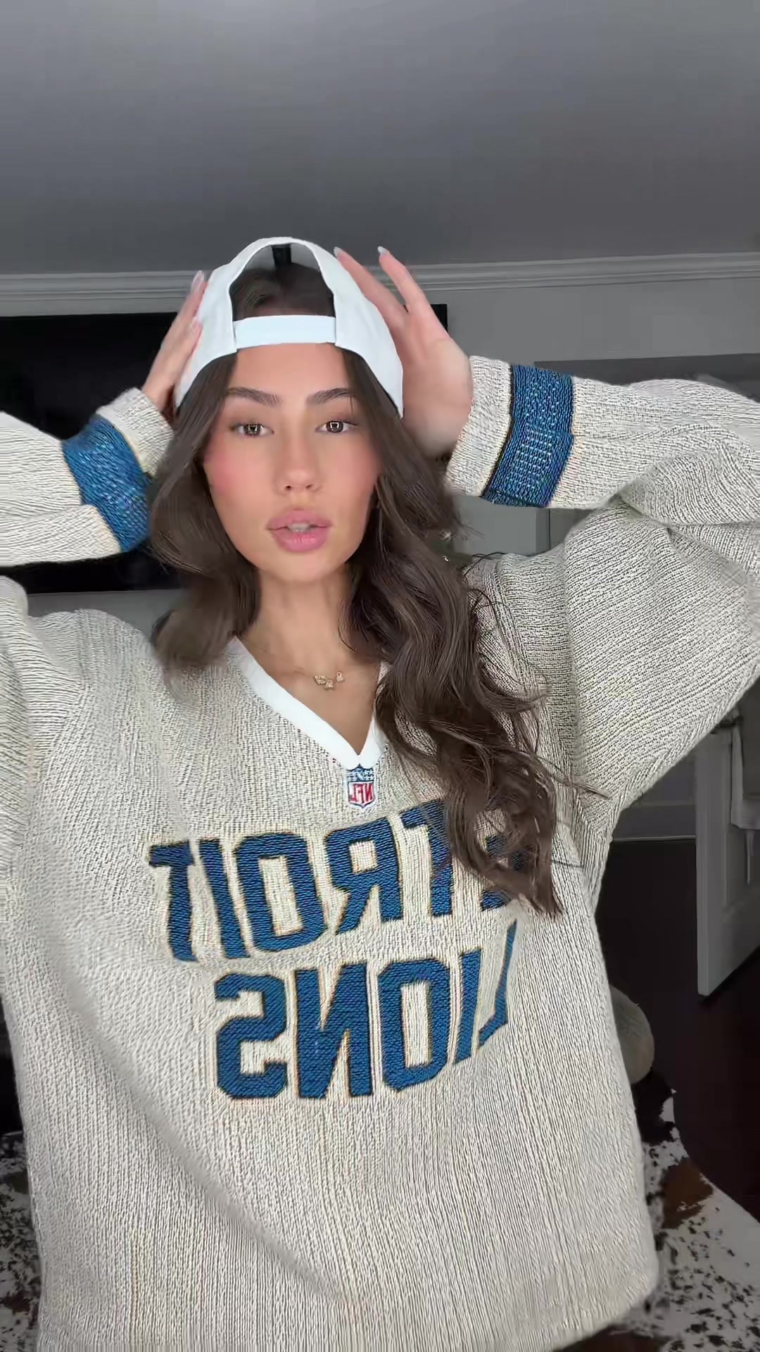 TikTok post by @nicolemadisyn for New Era Cap. Caption reads: White out game GDWM Ft @neweracap 🤍🤍🤍....