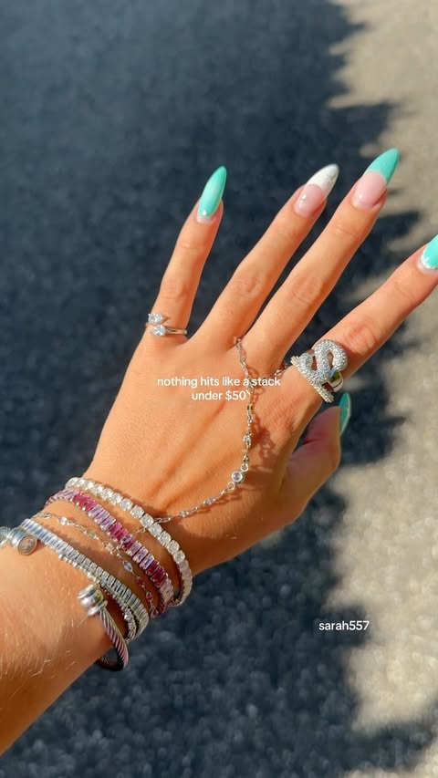 Instagram post by @sarahmcnaughton_ for EVRY JEWELS. Caption reads: Love a good stack @evryjewels use code sarah557....