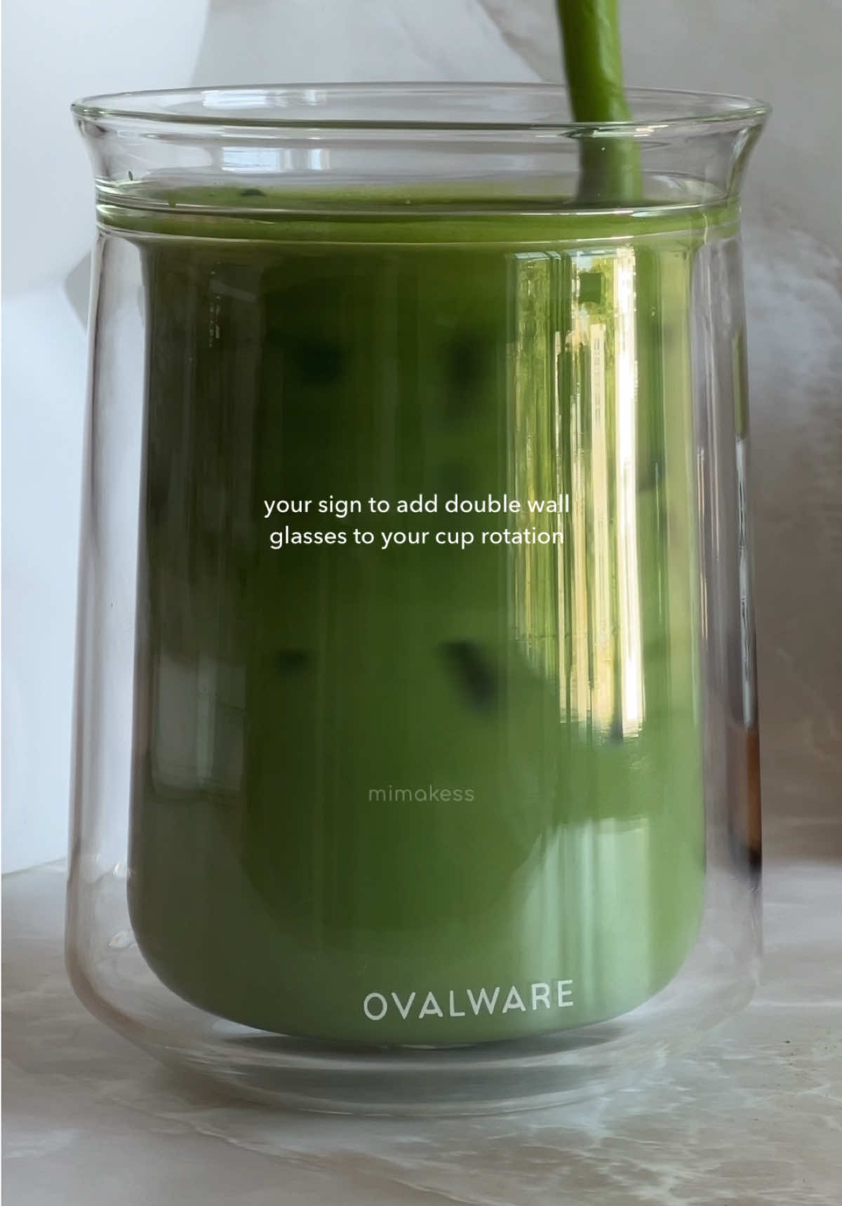 TikTok post by @mimakess for OVALWARE. Caption reads: @Ovalware’s double wall glasses cups have truly....