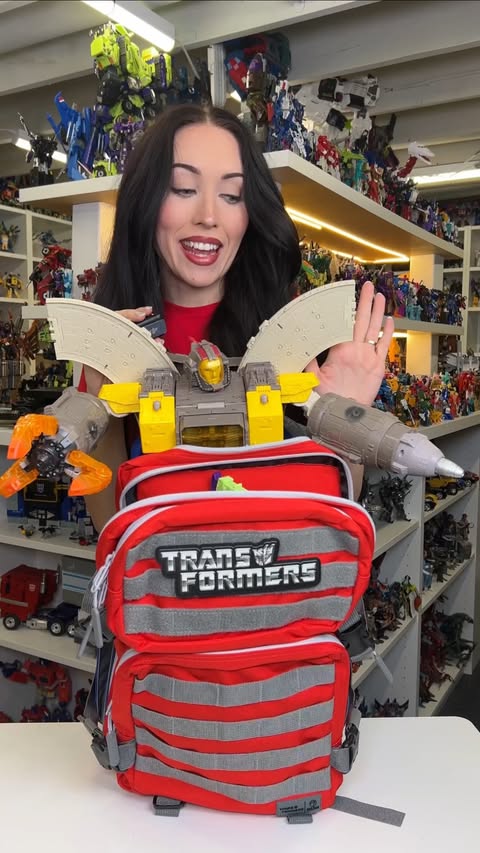Instagram post by @sydneymcardoso for Wolfpak. Caption reads: it can hold a lot (of Transformers) Wolfpak....