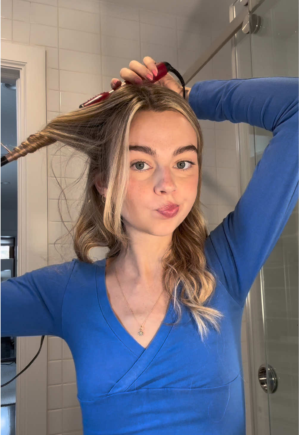 TikTok post by @sydtowle for K18 Hair. Caption reads: Healthy, bouncy hair every day with @K18 Hair‘s....