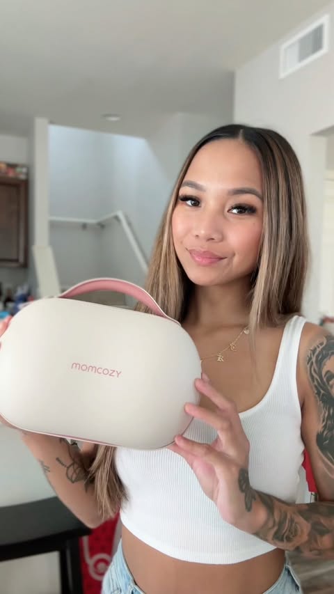 Instagram post by @michlennbocoboc for Momcozy. Caption reads: @momcozy Air1’s FIRST Amazon deal 😍

Use code:....