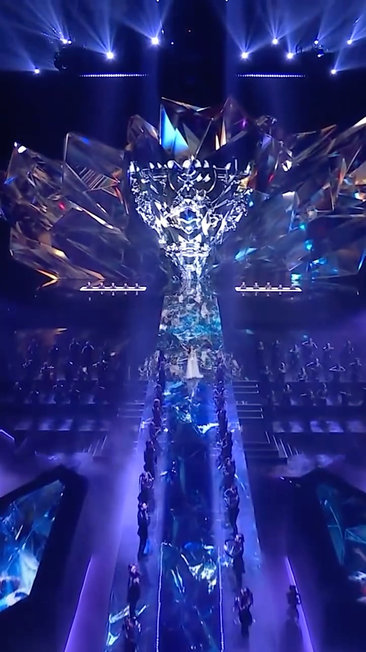 Instagram post by @chrissycostanza for League of Legends. Caption reads: LEGENDS NEVER DIE 🏆

Opening Ceremony presented....