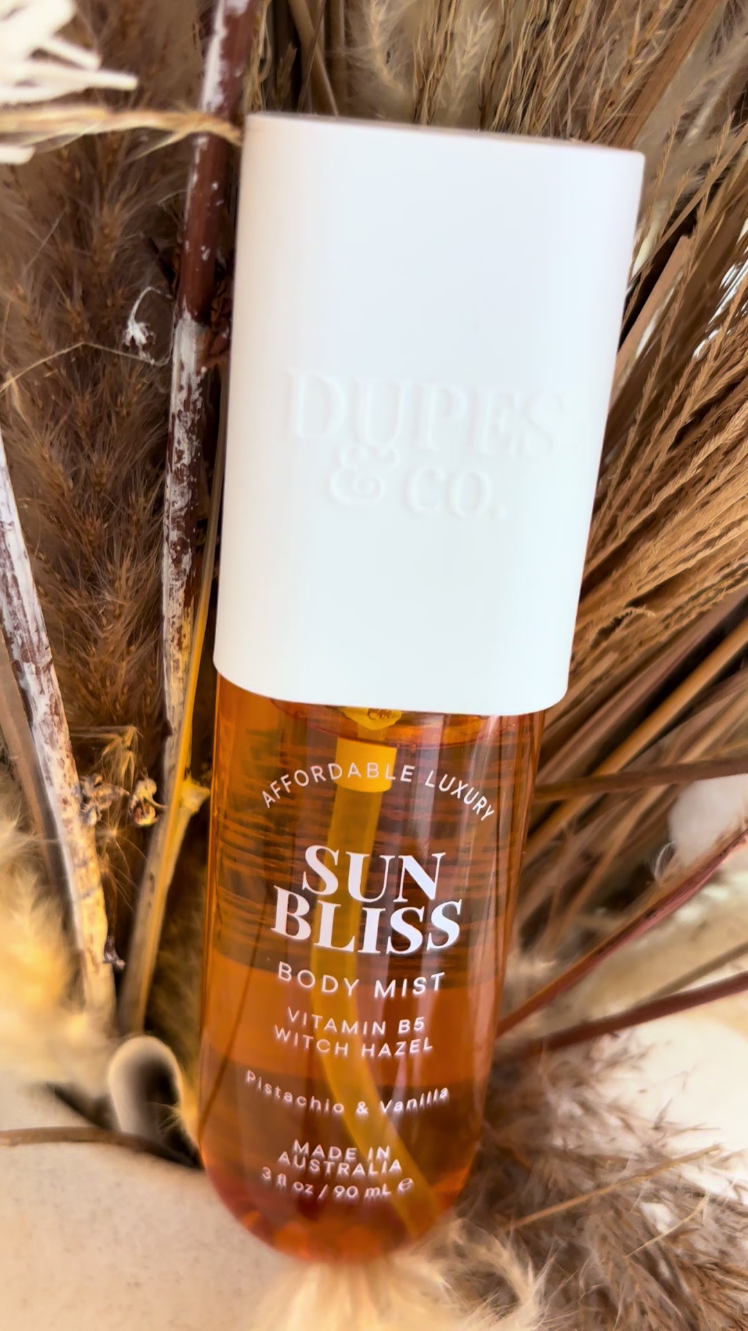 TikTok post by @laerae03 for Dupes & Co.. Caption reads: Dupes & Co Sunbliss Body Mist in Pistachio Vanilla....