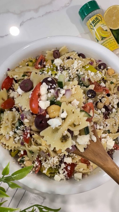 Instagram post by @dipped_tampa for True Lemon. Caption reads: Greek Pasta Salad with a home made zesty dressing....