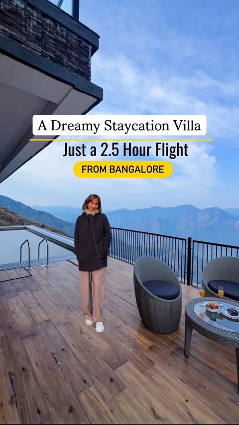 Instagram post by @tipsytimezones for StayVista. Caption reads: Situated on a hilltop with uninterrupted views of....