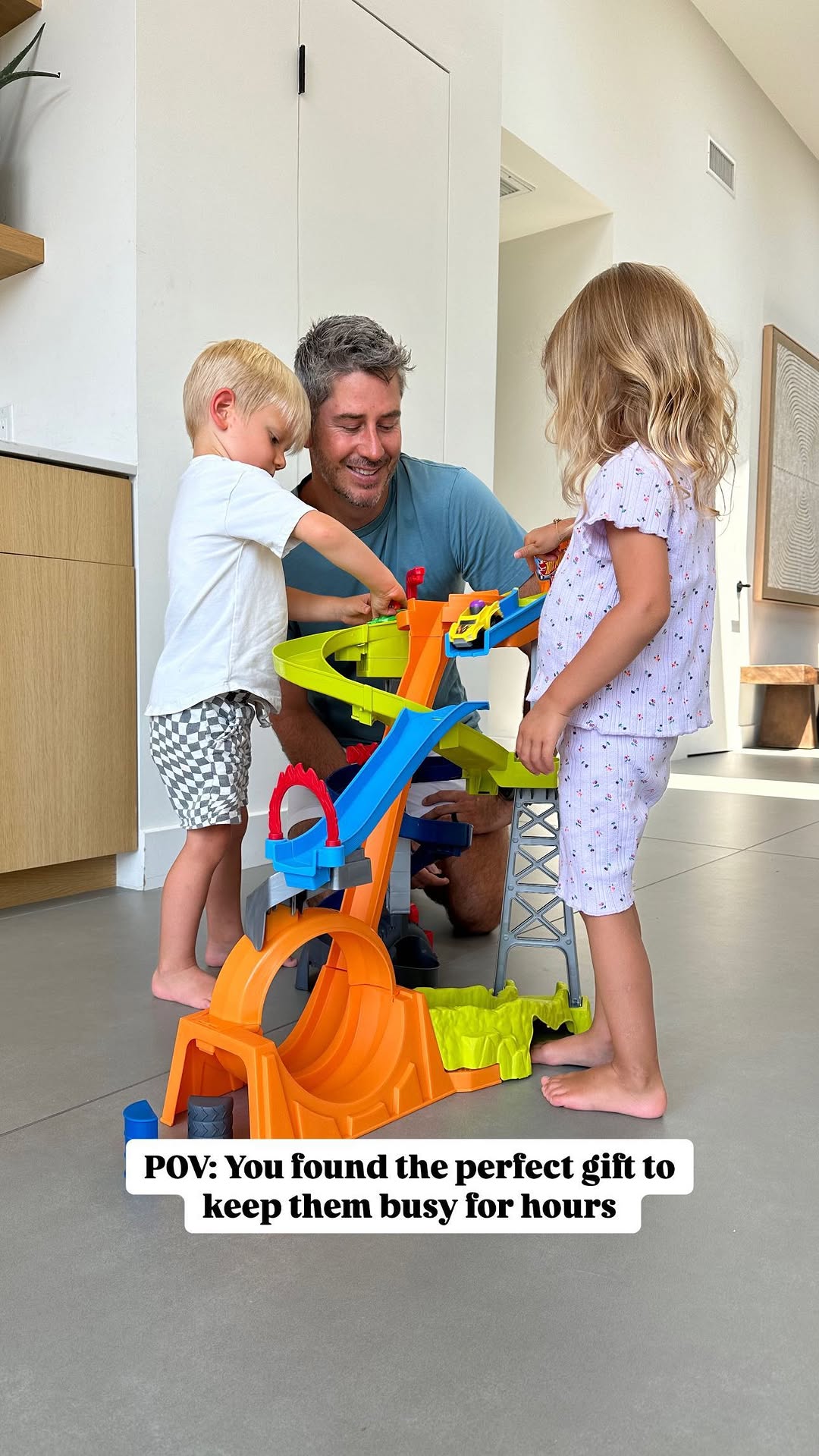 Instagram post by @ariejr for Fisher-Price. Caption reads: I grew up playing with Hot Wheels so this feels....