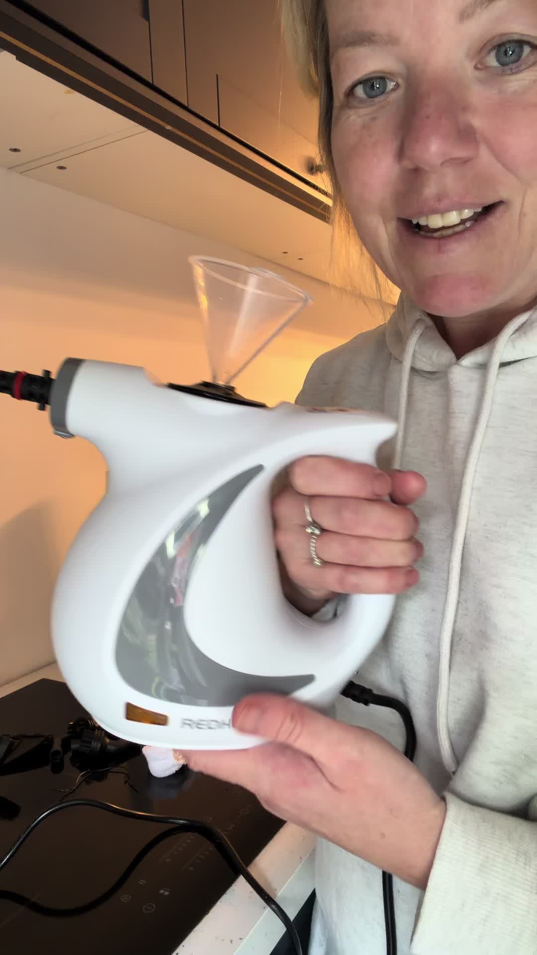 TikTok post by @sallylovelife2021 for REDHUT. Caption reads: Wow the Redhut steam cleaner is a must for any....