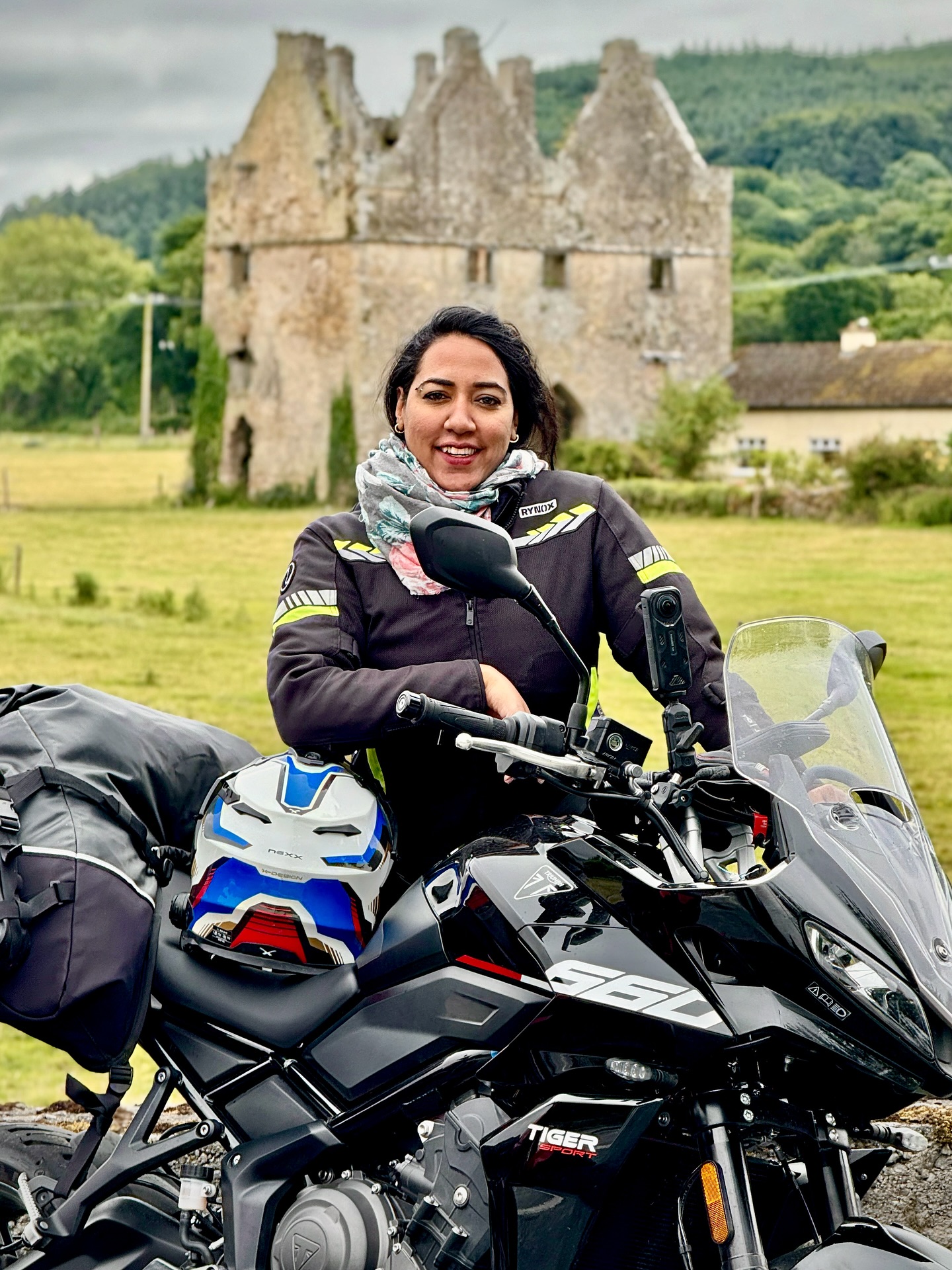 Instagram post by @candidalouis for Triumph UK. Caption reads: Made it to Ireland 😻 riding through the....