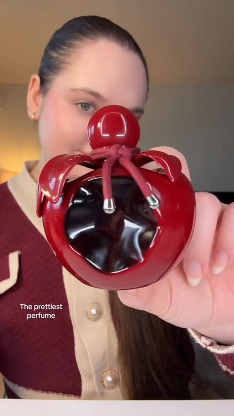 Instagram post by @finnolyaa for NINA RICCI. Caption reads: Nina Ricci Nina rouge crush 🍒🌹❤️ @ninaricci....