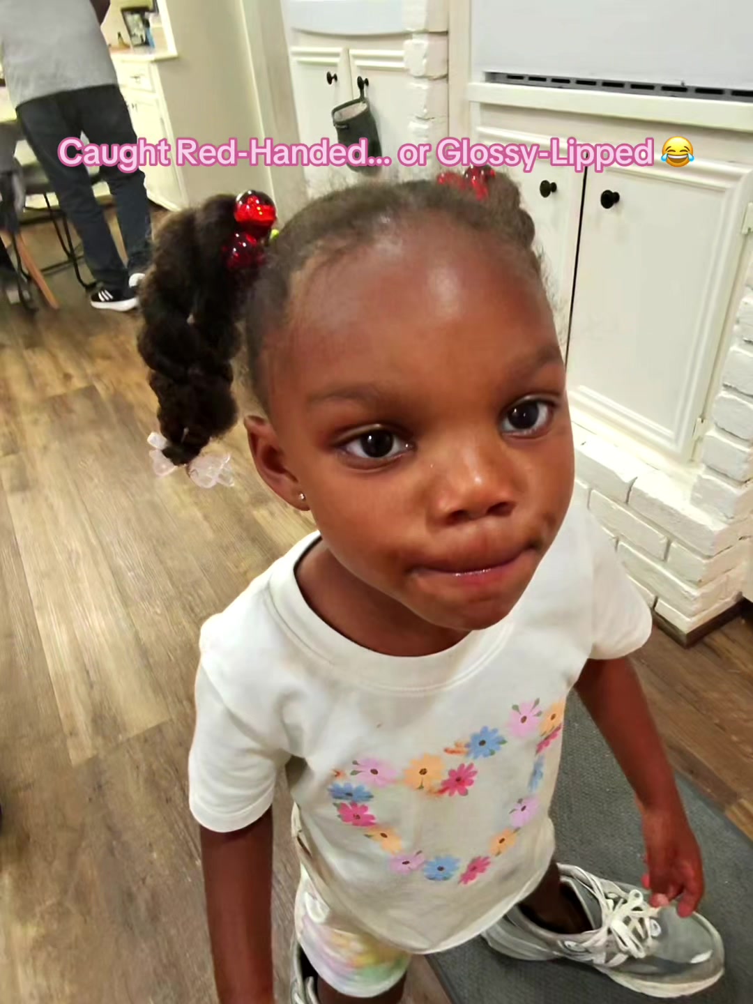 TikTok post by @watsontwinsx2 for Fenty Beauty. Caption reads: When your toddler gets into your Fenty gloss and....
