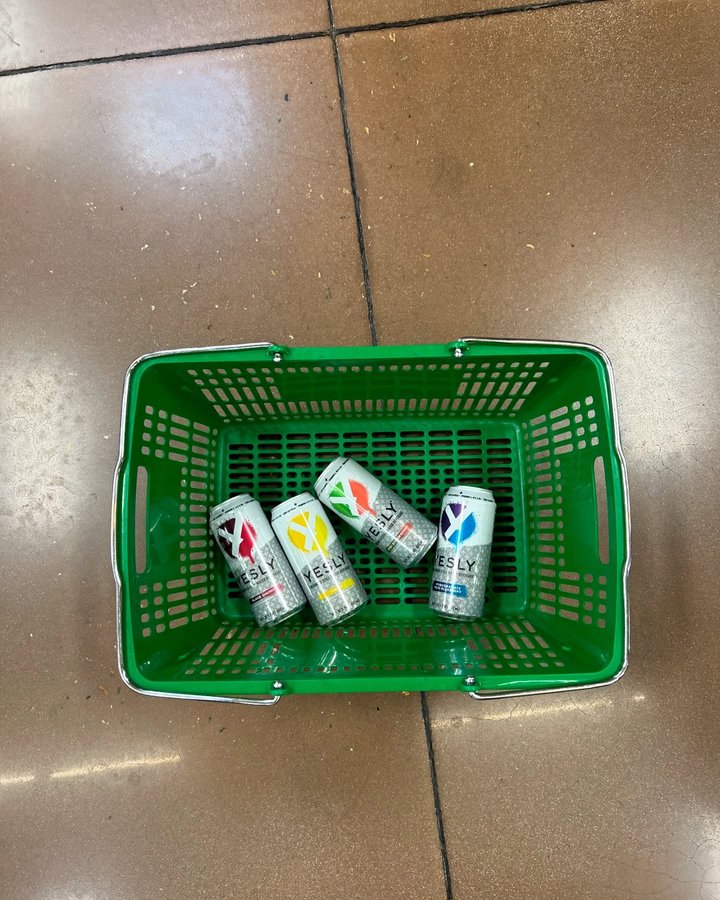 Instagram post by @smiithella for Yesly Water. Caption reads: Staying hydrated on and off the court with....