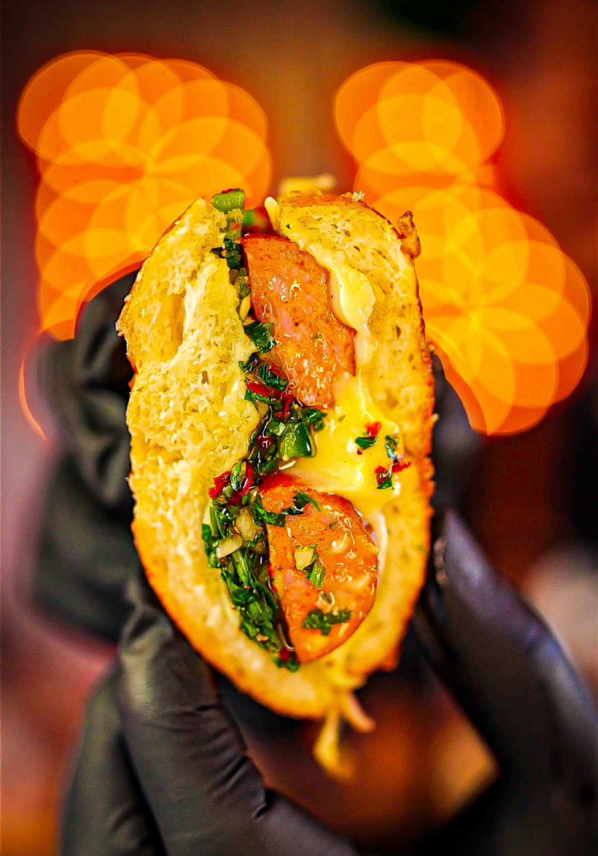 TikTok post by @tfti.bbq for Dietz & Watson. Caption reads: 𝘾𝙃𝙀𝙀𝙎𝙔 𝘾𝙃𝙊𝙍𝙄𝙋𝘼𝙉 🧀🌭🥖 The choripán....