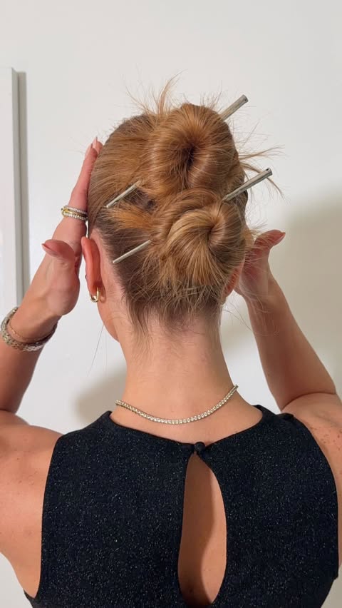 Instagram post by @anggwells for Tangle Teezer. Caption reads: The slick back you didn’t know you needed 

Using....