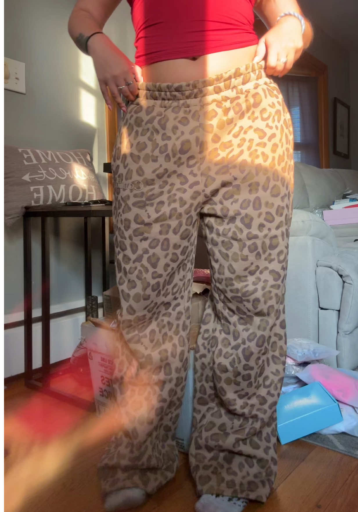 TikTok post by @emma.ry for Comfrt. Caption reads: i’m really obsessed with these sweatpants🤭....