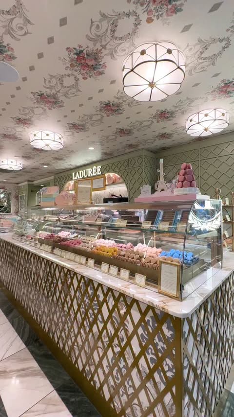 Instagram post by @londoncoffeeshops for LADUREE PARIS OFFICIEL. Caption reads: #Ad Love is truly in the air 💘 I visited....