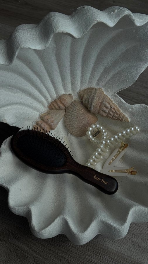 Instagram post by @toriroyelle for Bur Bur. Caption reads: [...] #HairCareTools #hairbrush #burbur #haircare....