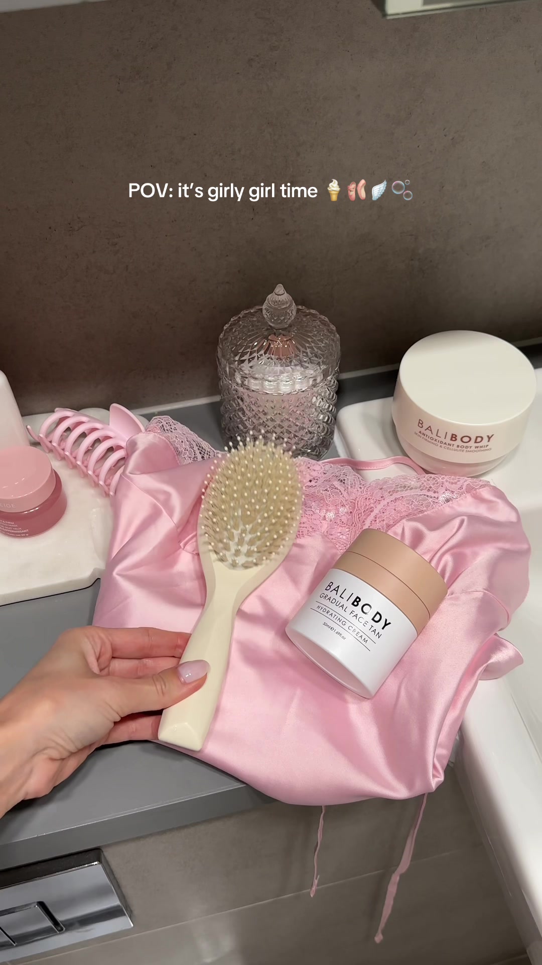 TikTok post by @adelinavolynskaia for balibody. Caption reads: Tanning night = girly night ✨ obsessed with this....