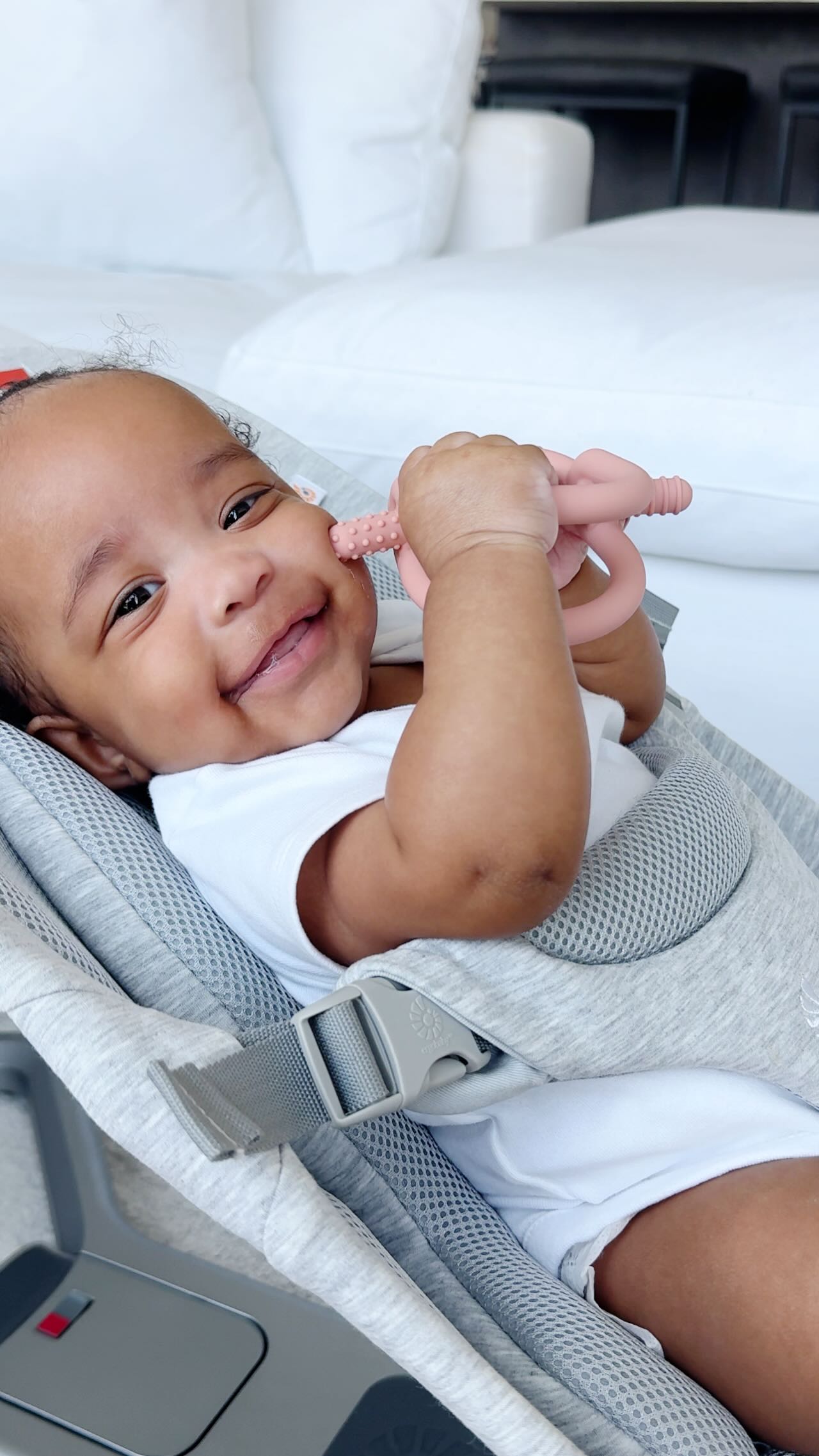 Instagram post by @caramel_chris for Ergobaby. Caption reads: #ErgobabyPartner This is an every mom MUST HAVE!....