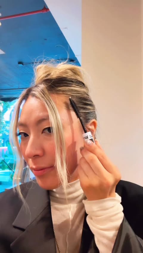 Instagram post by @lizrimhair for IGK Hair. Caption reads: To my updo girlies! 💕 
Get sleek with our Frizz....