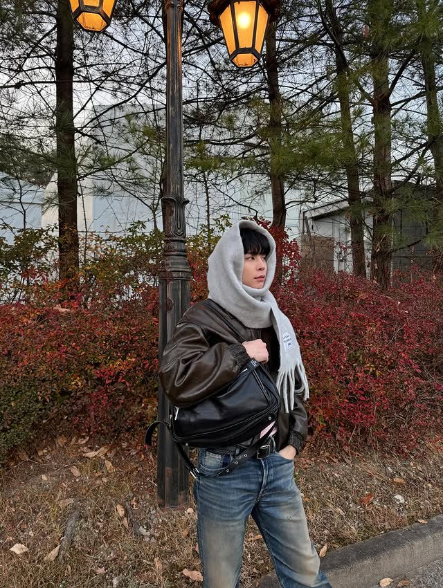 Instagram post by @johnnyjsuh for Acne Studios. Caption reads: 🥶.