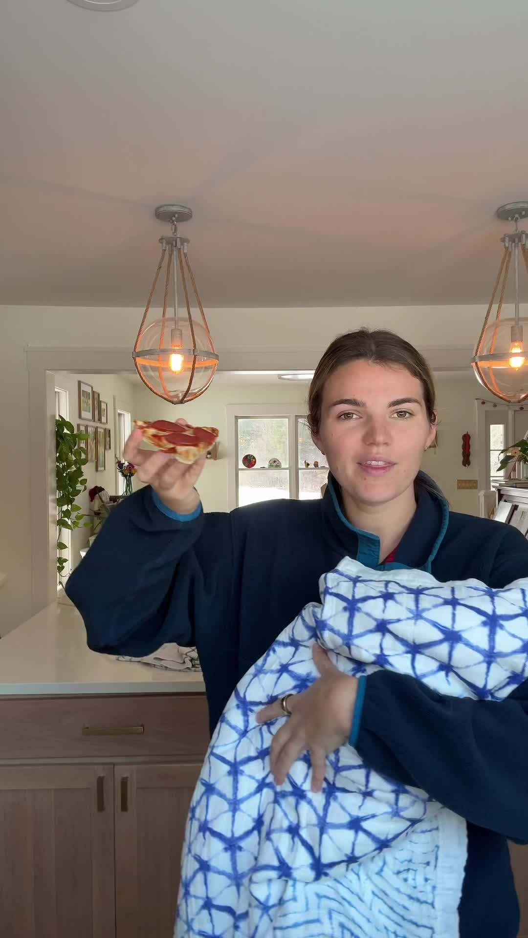 TikTok post by @maiaknight for Red Baron Pizza. Caption reads: Wait... did I really have another baby? 👀 @Red....