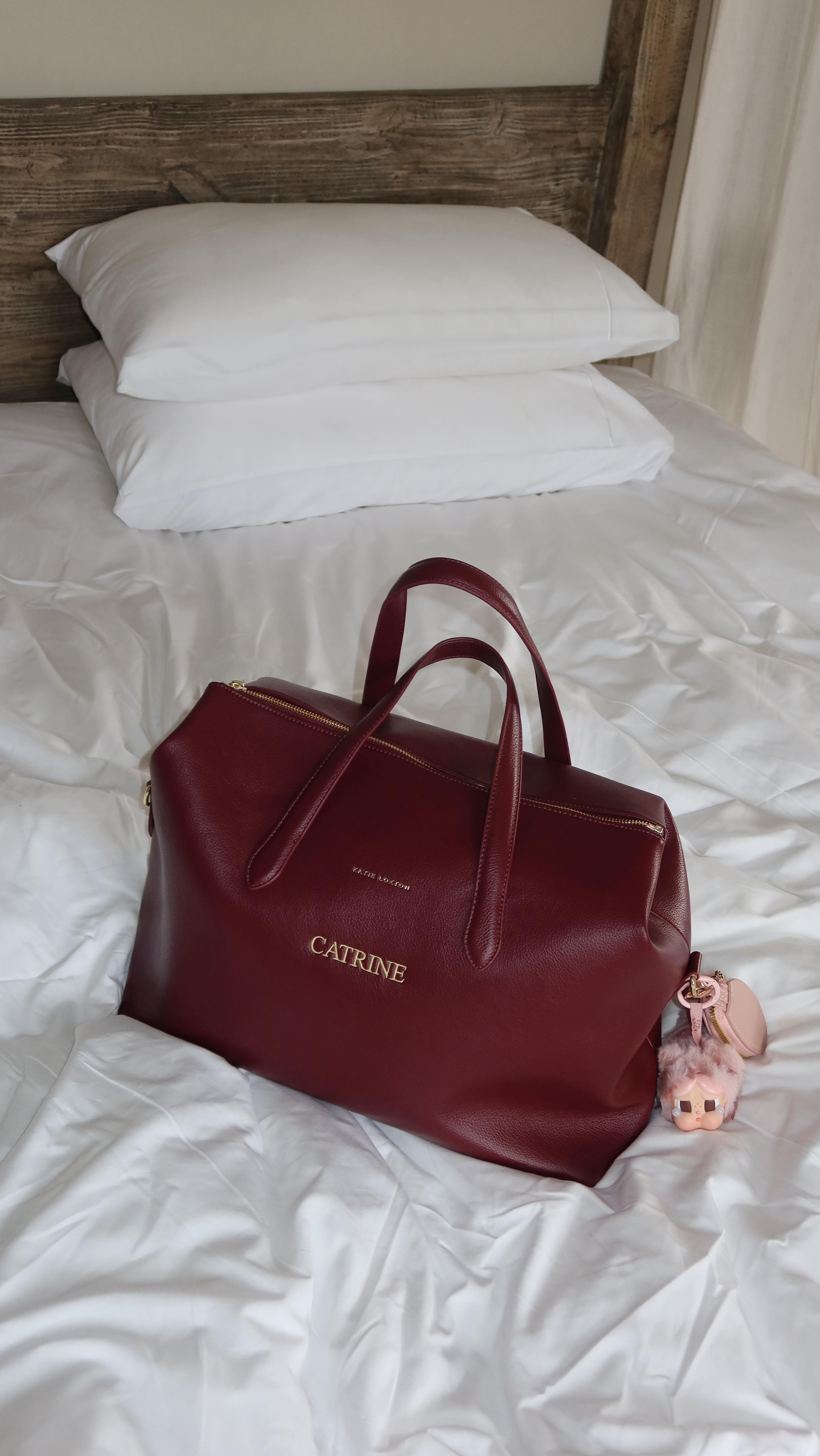 Instagram post by @catrineclarke for Katie Loxton. Caption reads: Putting my name on everything atm 😋😋

my....