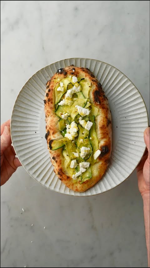 Instagram post by @theoneeighthitalian for Ooni. Caption reads: [...] to going on the pizza. 🔥 Baked in the Ooni....