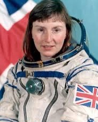 Instagram post by @astro_timpeake for NASA. Caption reads: It’s International Day of Women and Girls in....